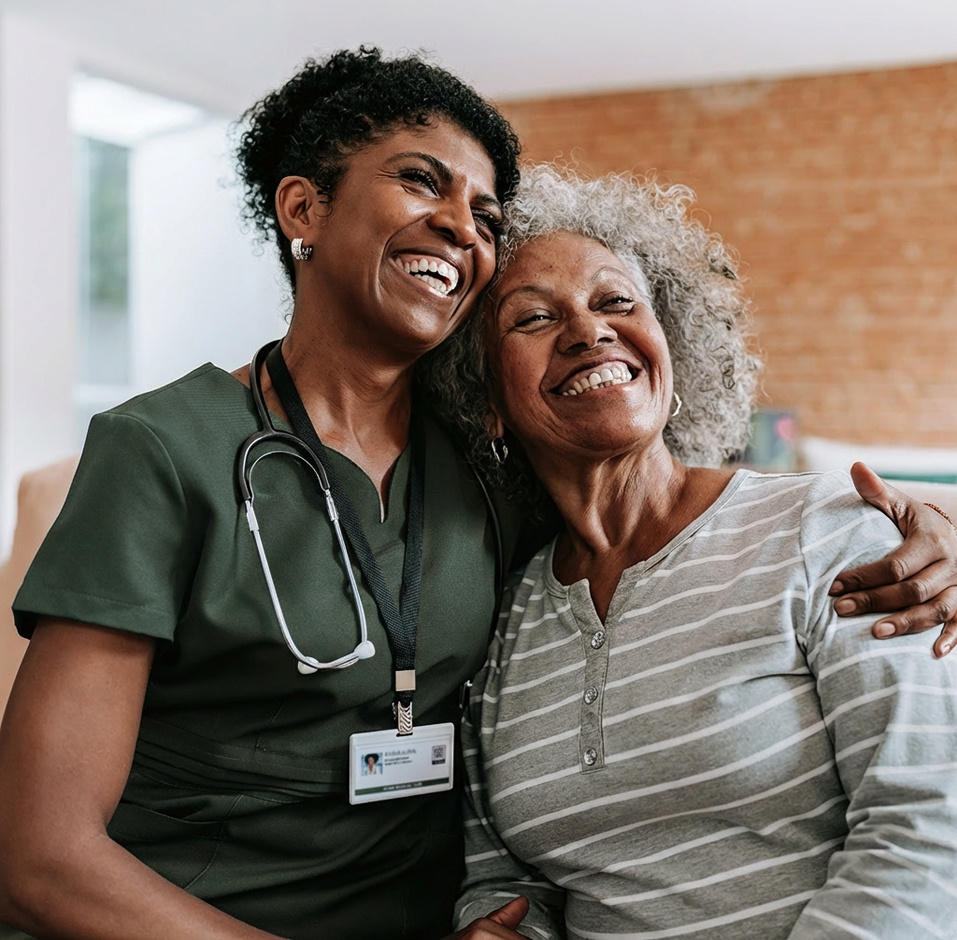A nurse embracing and supporting an older member